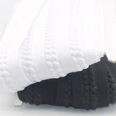 2 meter Elastic Trimming 45mm (with 20mm embossed design) available in Black or White